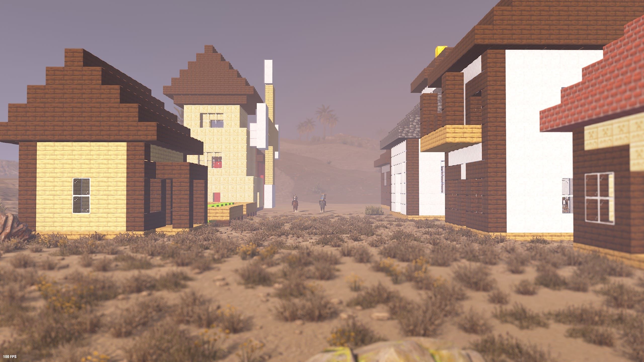 A desert street lined with cube-built houses